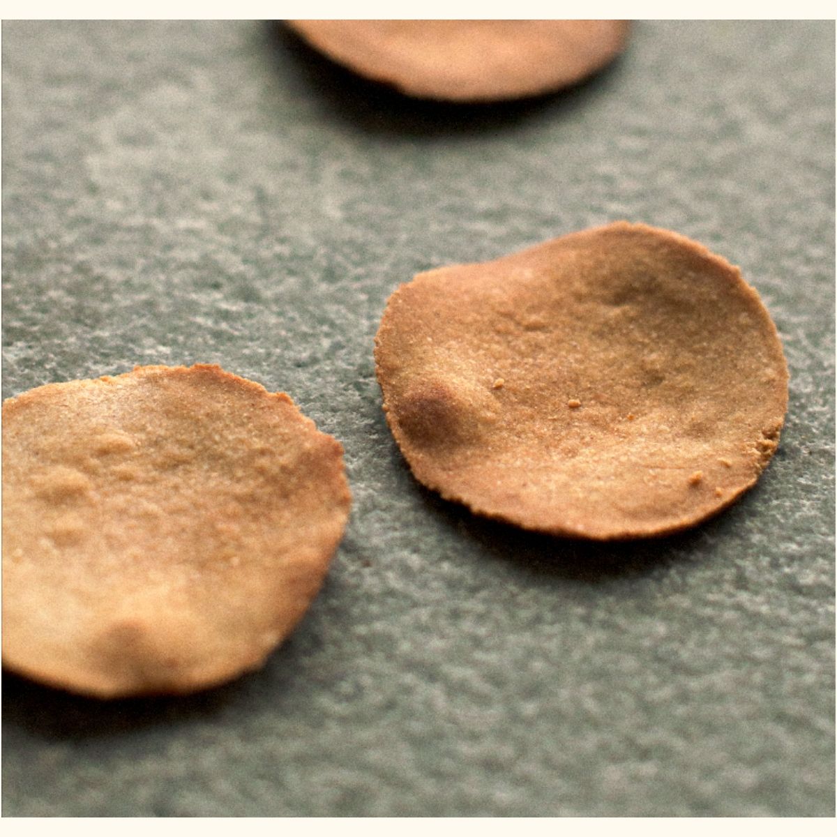 An image of the wheat-free cracker that is freshly baked and is perfect for having with cheese and spreads