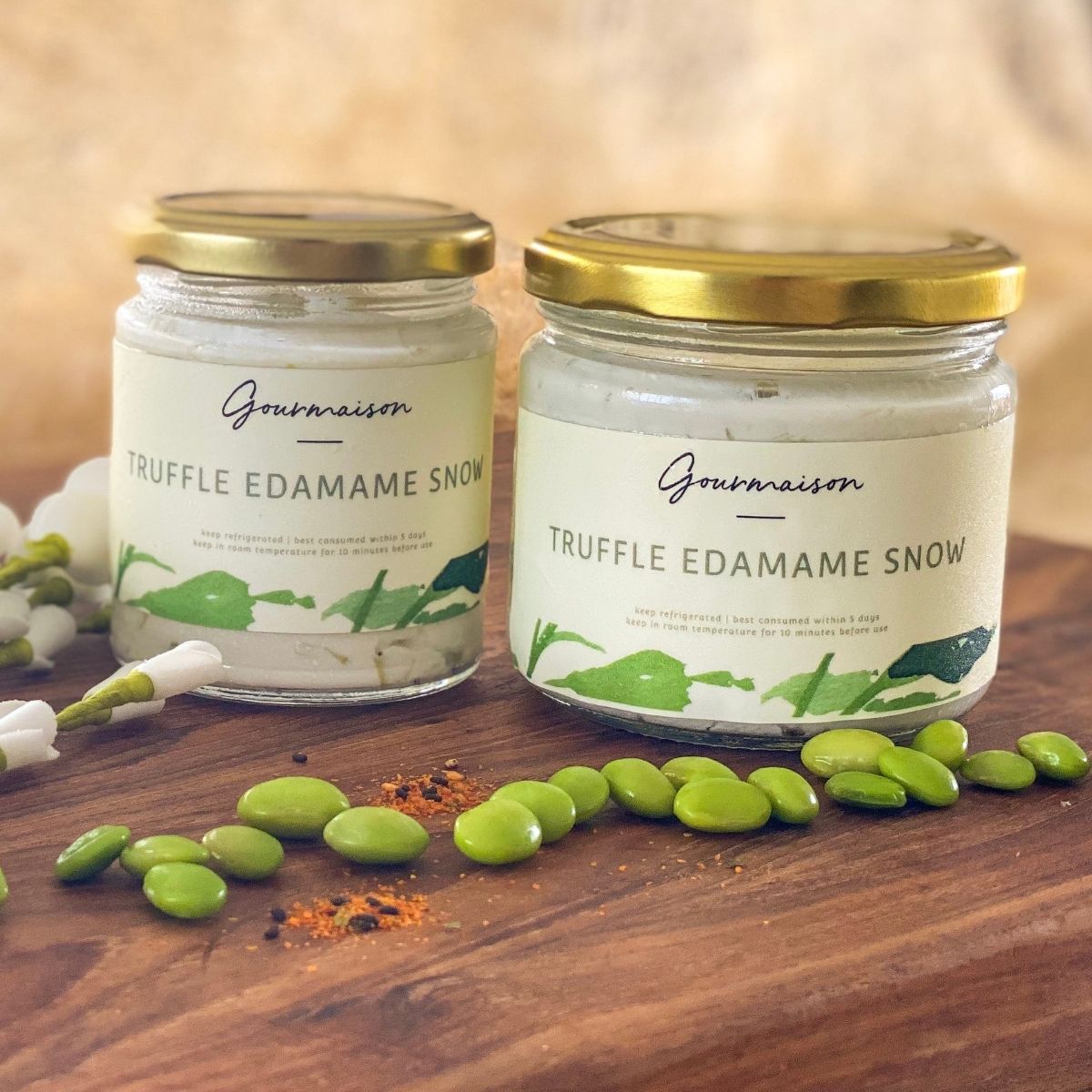 An image of the truffle edamame snow spread in sizes of 170gms and 230gms, a soft cloud of cheese with edamame and truffle.