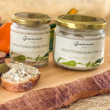 Load image into Gallery viewer, An image of Mediterranean Spread in sizes of 170gms and 230gms, a smooth cheese spread with olives and herbs.  Edit alt text