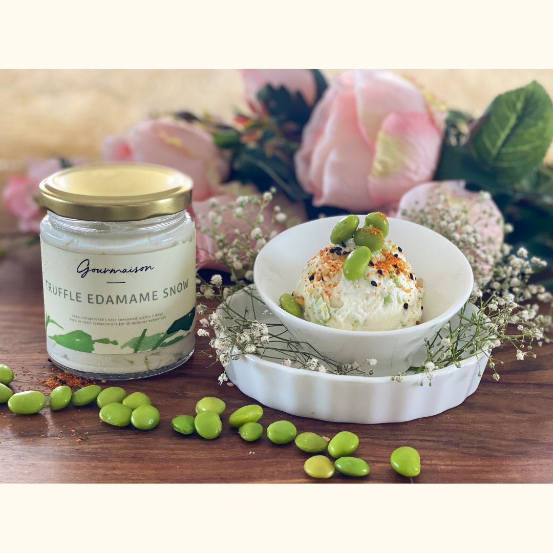 An image of the truffle edamame snow spread in sizes of 170gms and 230gms, a soft cloud of cheese with edamame and truffle.